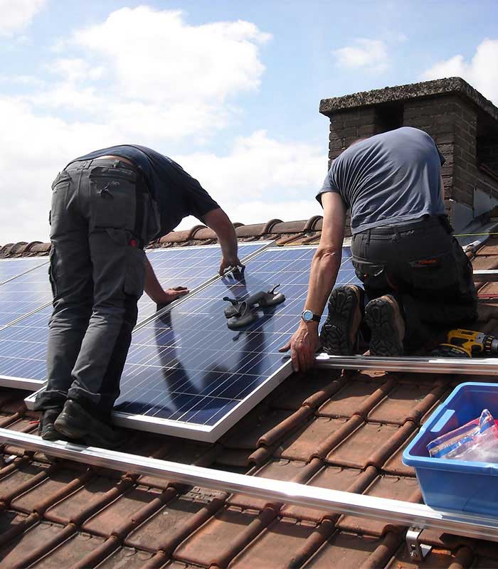 Suyog Enterprises solar team at a rooftop installation site in Pune